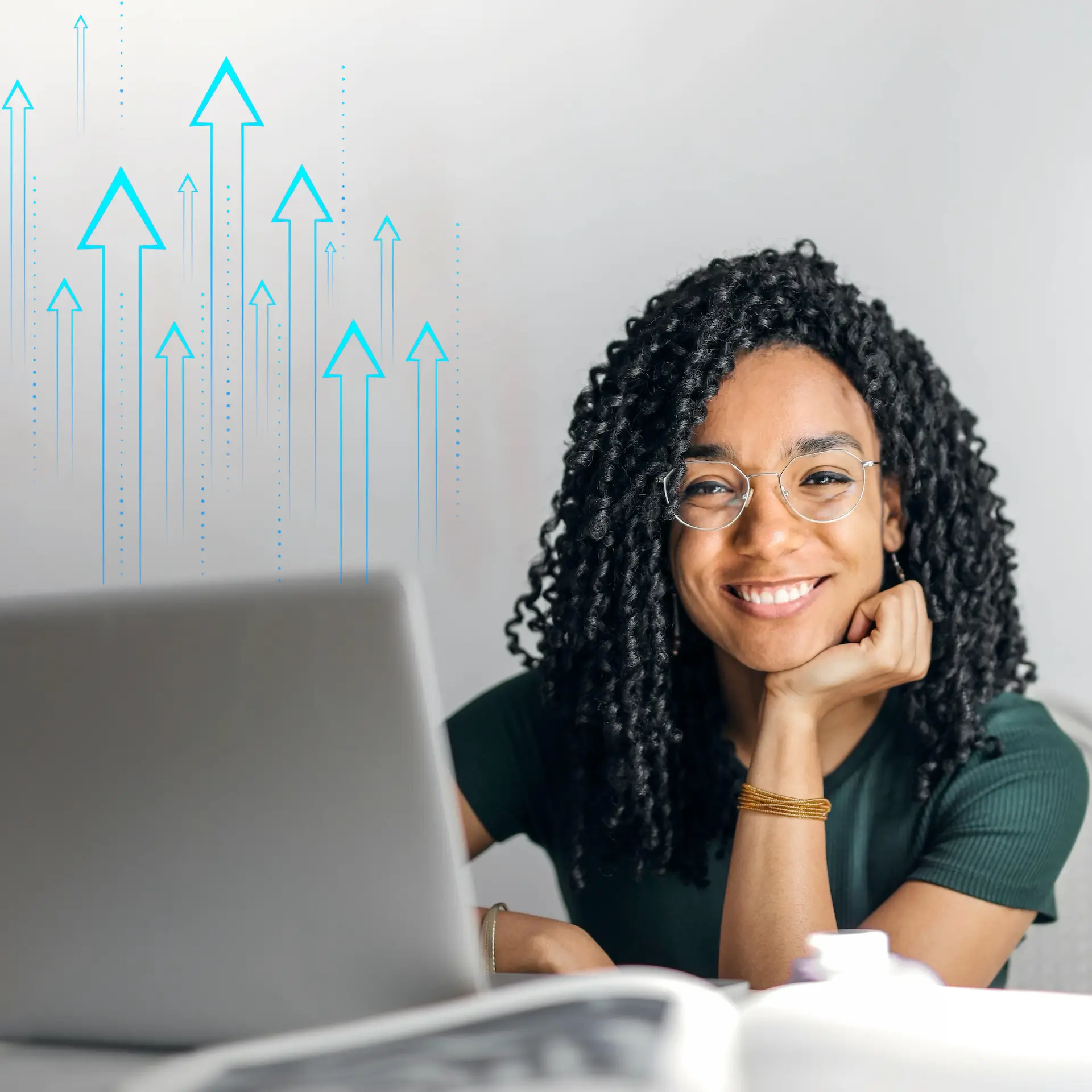 pexels-olly-3769021 A positive happy looking young lady working at her laptop